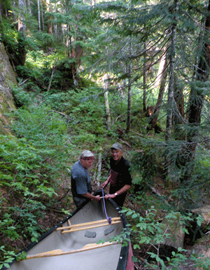 Portaging canoes in Strathcona Park